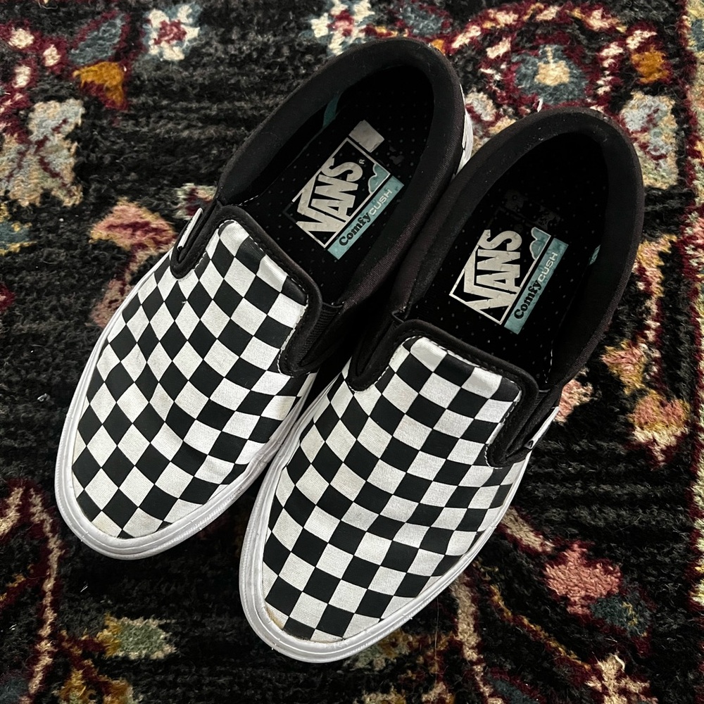 Vans Black and White Slip-On Sneakers